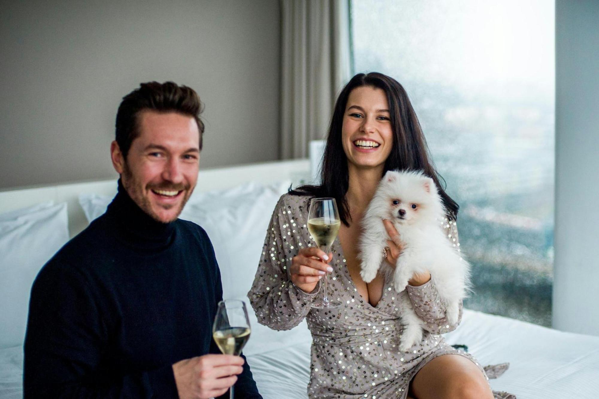 The Westin Hamburg Elbphilharmonie Hotel Exterior photo A couple with a dog